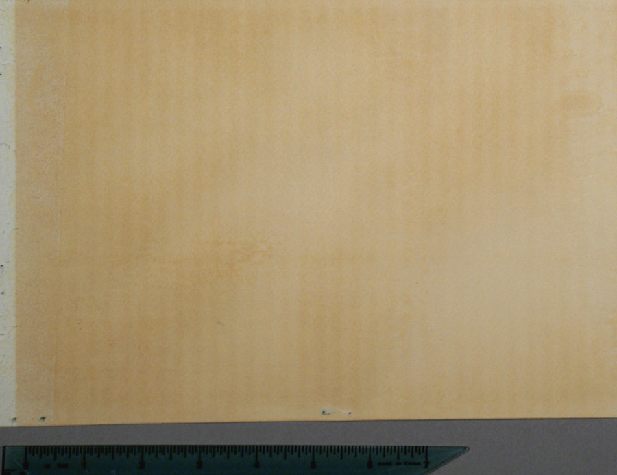 Acid Burn Showing Ripples From Cardboard Backing